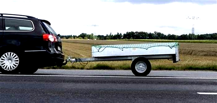 Electric Vehicle Towing a Trailer Tips for Safe and Efficient Hauling width